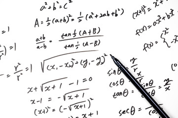 A note full of mathematical formulas. Education concept