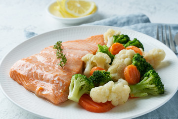 Steam salmon and vegetables, Paleo, keto, fodmap, dash diet. Mediterranean food with fish