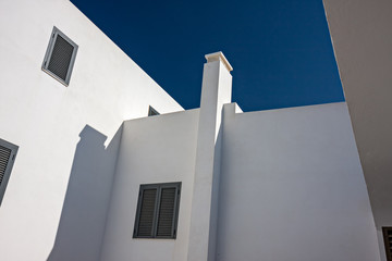 The precise geometries of the sunny, white Spanish houses of the island of Formentera.