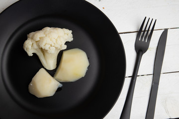 cooked cauliflower dish with potatoes