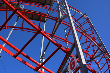 Colorful amusement park funfair rides and vintage slot machines with vibrant colours background...