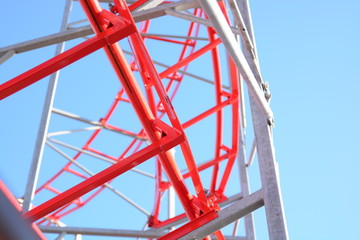 Colorful amusement park funfair rides and vintage slot machines with vibrant colours background...