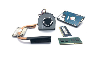 Fan, cooling system, hard drive and RAM for laptop isolated on a white background. Composition fan for the cooling system, RAM and hard drive. Copper tubes of the cooling system.