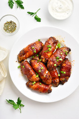 Bacon wrapped grilled chicken wings