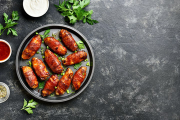 Bacon wrapped grilled chicken wings