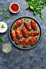 Bacon wrapped grilled chicken wings