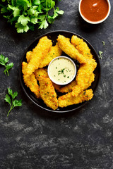 Crispy fried breaded chicken breast strips