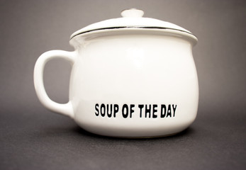 soup of the day chefs special. White soup bowl with text soup of the day.