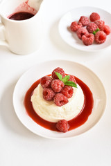 Panna cotta with fresh raspberries
