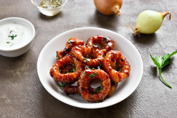 Bacon wrapped onion rings