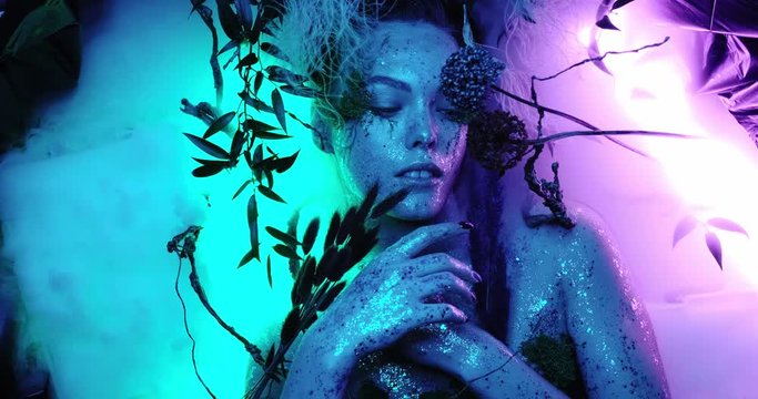 mystic style fabulous forest virgin nymph long dark black hair found flaming fiery flower butterflies pixie fly. gothic goddess sexy spirit lady make-up Art 4k quality close up portrait