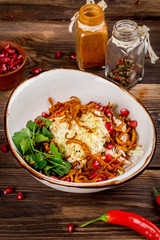 Georgian salad with pomegranate and fresh herbs