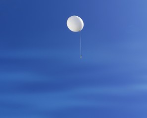 Wide shot of a white balloon floating with blue skies in the background