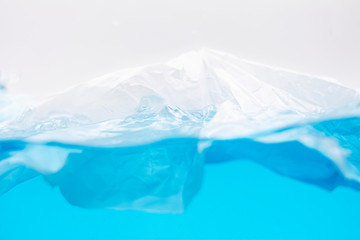 Plastic trash bag floating in the ocean Environmental problems of plastic pollutionVintage decoration,