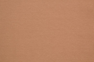 Fabric cotton fold, top view. Beige textile