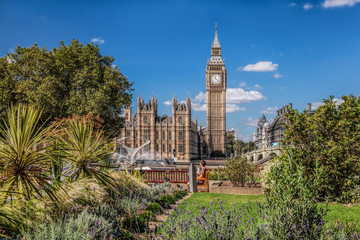 Big Ben with beautiful green garden in London, England, UK