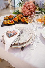 Wedding table for newlyweds with beautiful decorations