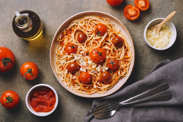 Tomato pasta with baked cherry tomatoes. Classic italian food
