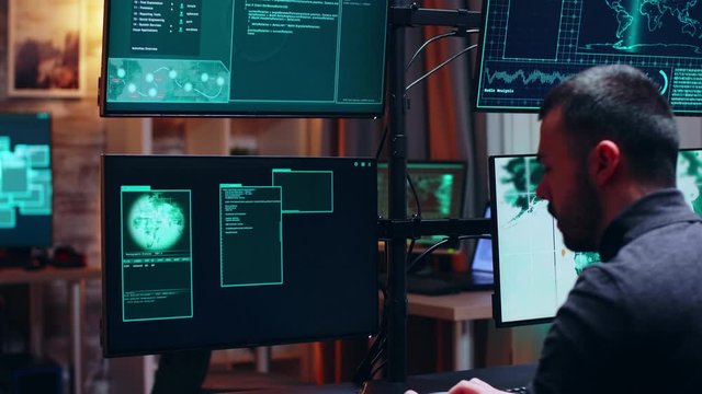 View of male hacker coding a dangerous virus