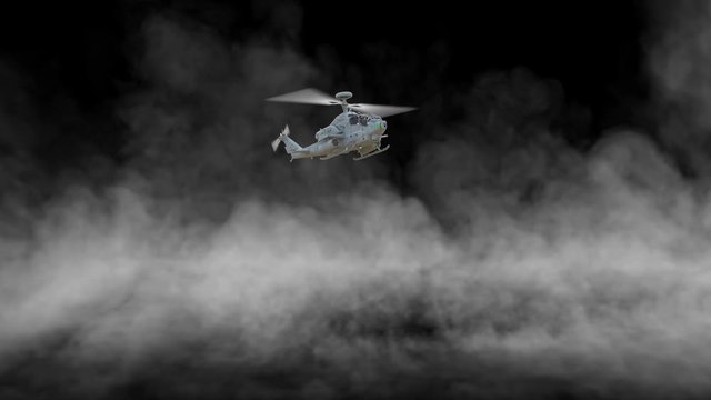 A military helicopter descends to the ground, raising dust around it. Animation with an alpha channel.
