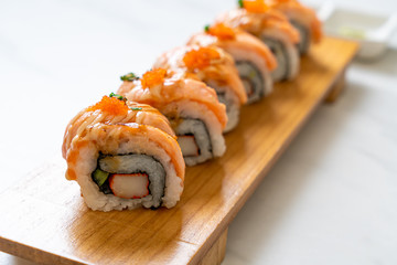 grilled salmon sushi roll with sauce