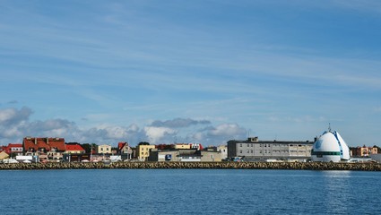 Hel, Poland. Panoramic view from the sea on the town, beach and breakwater. Sunny day on Hel Peninsula