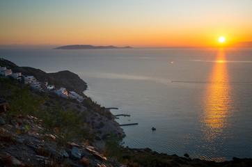 Obraz premium Sunset in Crete. Greek Island. Seaside of Crete island, Greece.