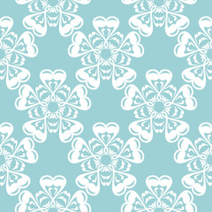 Fototapeta na wymiar White floral seamless pattern on blue background