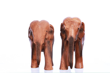 Wooden hand made elephant isolated on white