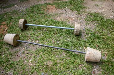 Original concrete dumbbells of different weight