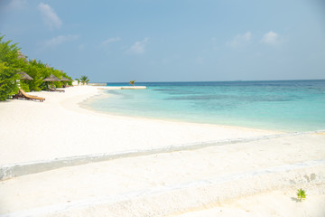 Fototapeta na wymiar Tropical beach resort in the Maldives
