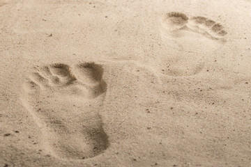 Footprints on the sand step