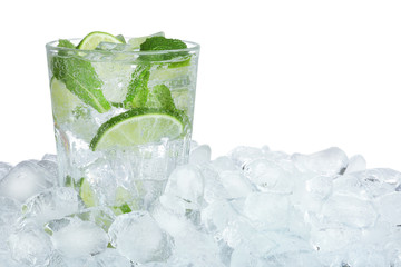 Ice cubes and delicious cocktail on white background
