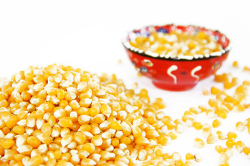 yellow round grains of natural dried corn in a decorative plate