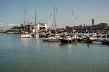Fototapeta na wymiar Boats and yachts in port of Bari, Italy