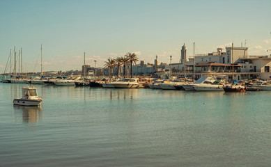 Fototapeta na wymiar Boats and yachts in port of Bari, Italy