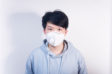 A man wearing a N95 medical protective mask