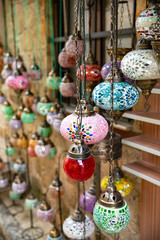 Vintage colorful Turkish lamps on street.