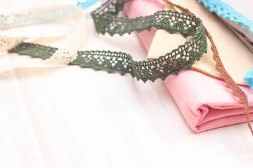 Background sewing. Ribbons, lace for sewing and creativity. Background with copy space.