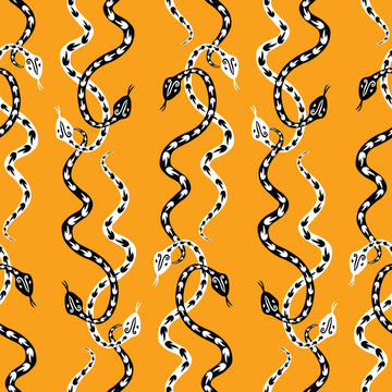 Seamless background of creeping decorative  snakes
