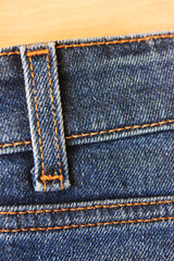 Denim jeans casual clothing apparel detail. Dark blue trendy vintage jeans element, close up of...