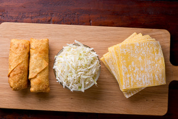 Eggrolls or Springrolls. Traditional Chinese, Thai or Japanese restaurant appetizer, fried. Made from wonton wrappers & filled with Chinese veggies and served w/ a chili dipping sauce or soy sauce.  