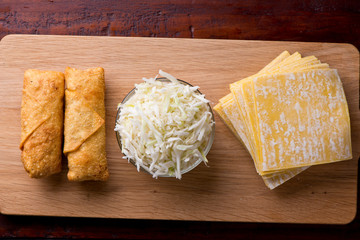 Eggrolls or Springrolls. Traditional Chinese, Thai or Japanese restaurant appetizer, fried. Made from wonton wrappers & filled with Chinese veggies and served w/ a chili dipping sauce or soy sauce.  
