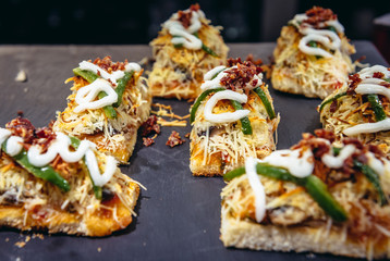 Traditional snacks called pinchos in tapas bar in San Sebastian city also called Donostia in Basque Country, Spain