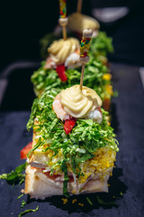 Traditional snacks called pinchos in tapas bar in San Sebastian city also called Donostia in Basque Country, Spain