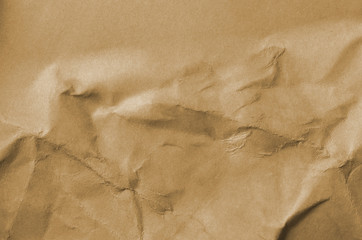 Creative background with scattered overlay of crumpled white paper.