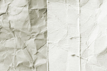 Creative background with scattered overlay of crumpled white paper.