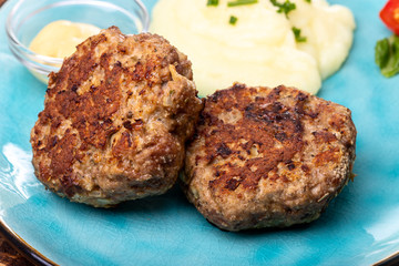 two bavarian meat loafs on a plate