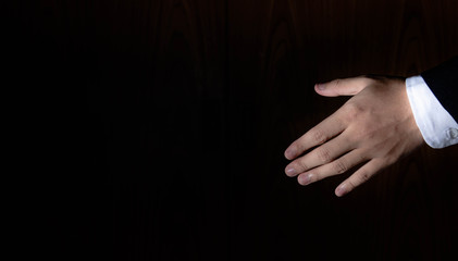 The protruding hand made the promise or greet.