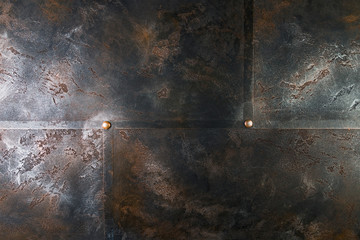 Metal structure with rivets and rusty surface